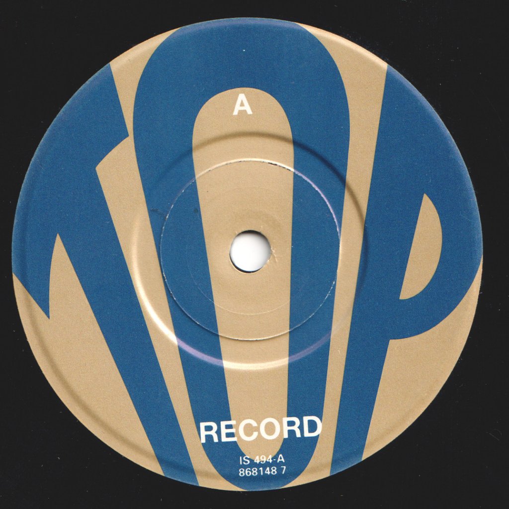 Top - She's Got All The World - 7 Inch