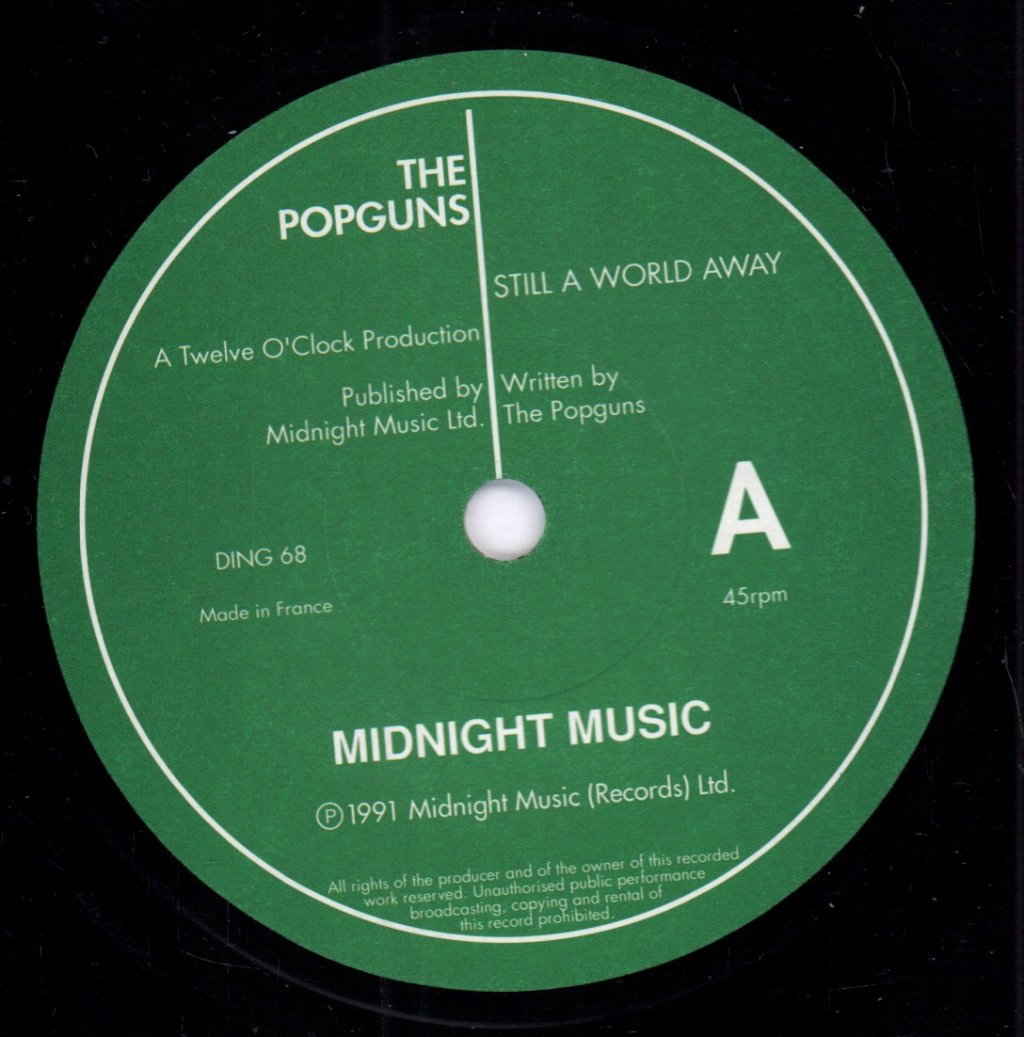 Popguns - Still A World Away - 7 Inch