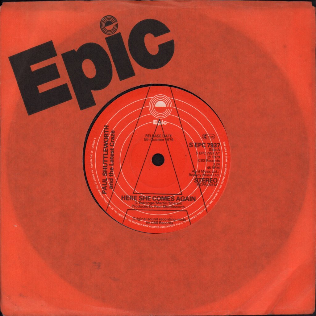 Paul Shuttleworth And The Latest Craze - Here She Comes Again - 7 Inch