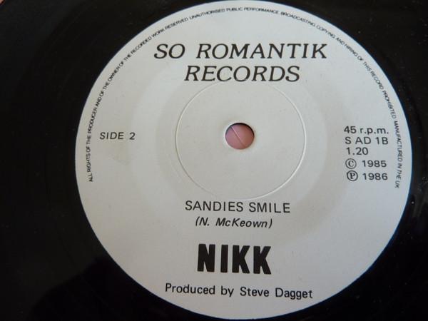 Nikk - A Song From The Heart b/w Sandie's Smile - 7 Inch